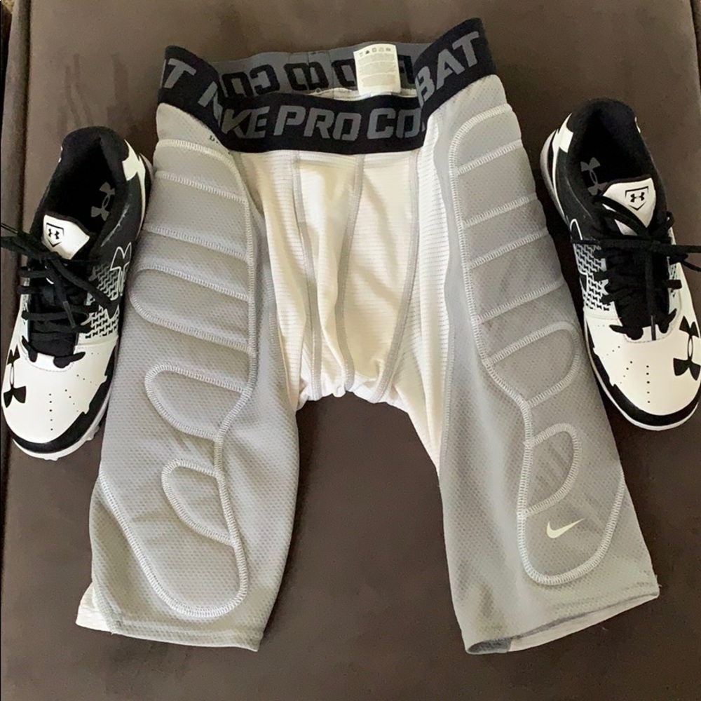 Under armor baseball cleats and Nike compressions